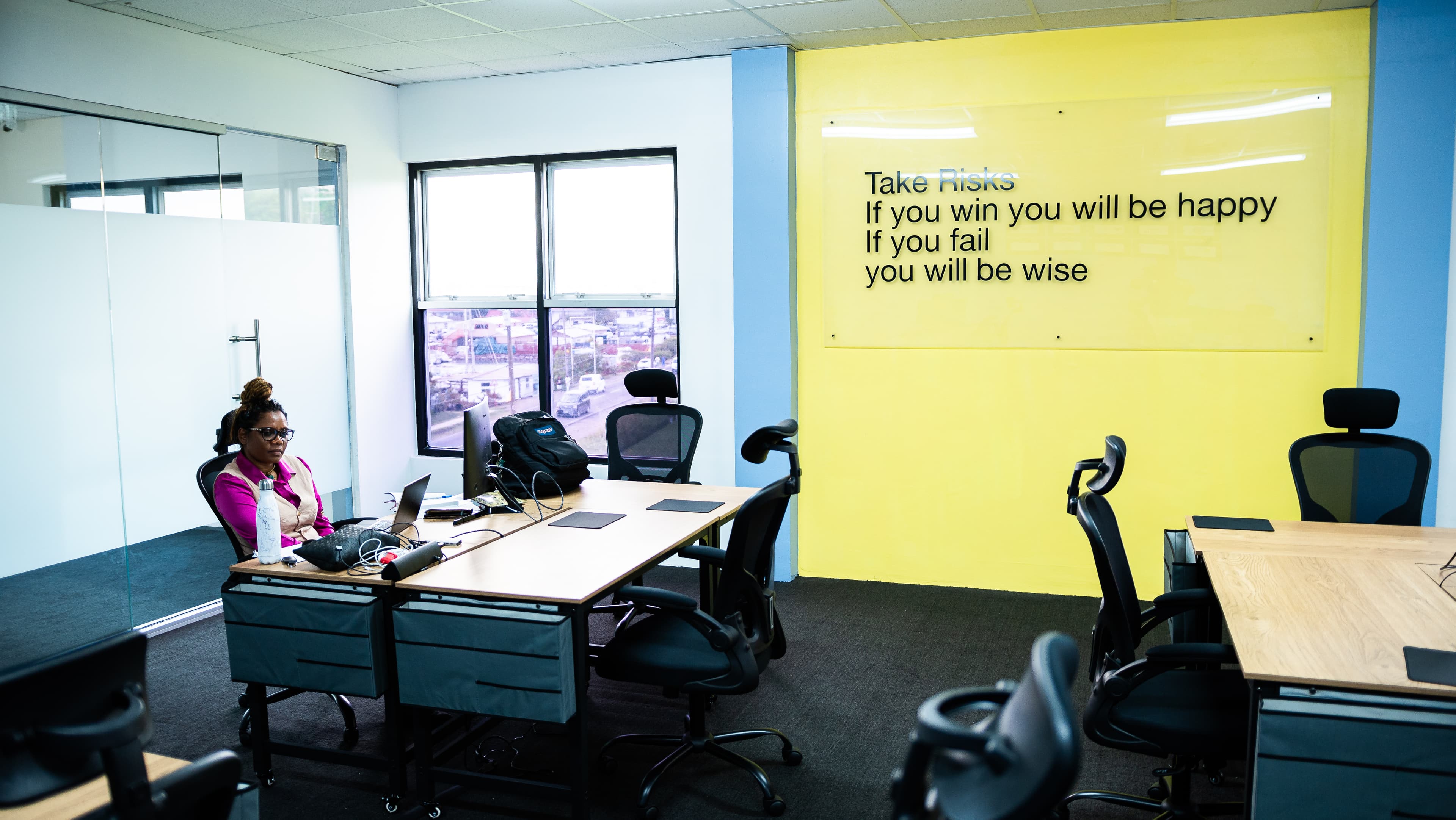 Meeting room with ergonomic seating and city view