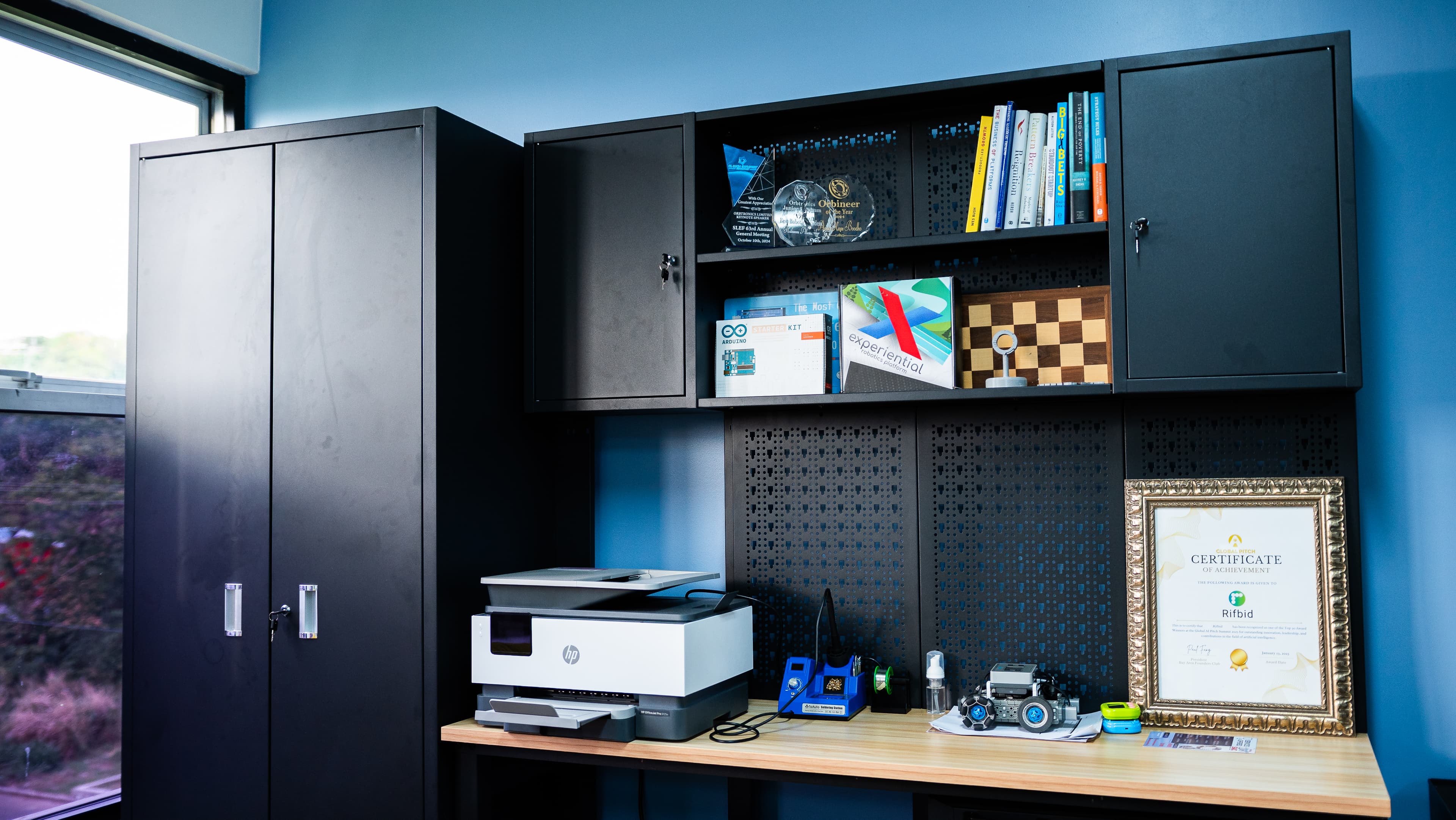 Co-working workspace with shelving and seating area