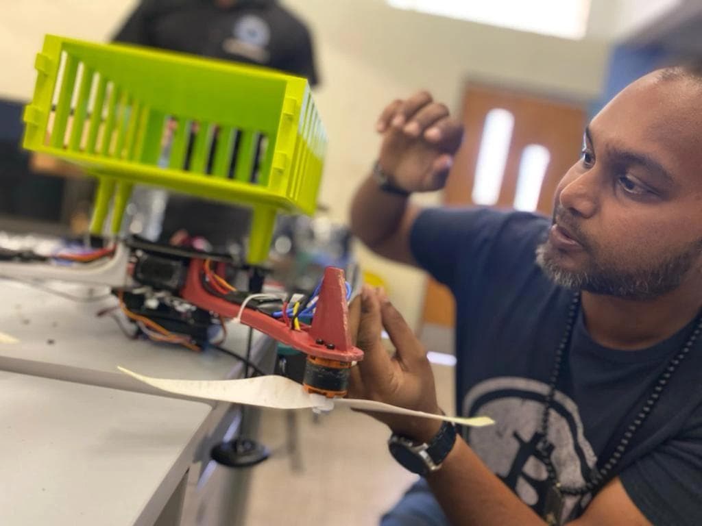 A man working with robots